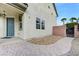 Home exterior with brick walkway leading to the front door, plus gated side yard access at 733 Secret London Ave, Las Vegas, NV 89178