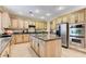 Gourmet kitchen features stainless steel appliances and granite countertops at 733 Secret London Ave, Las Vegas, NV 89178