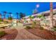 Luxurious backyard featuring a pool, spa, and desert landscaping, perfect for relaxation and entertainment at 733 Secret London Ave, Las Vegas, NV 89178