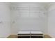 Walk-in closet with shelves, white walls, and carpeted floor is ready for organizing clothes, shoes, and accessories at 733 Secret London Ave, Las Vegas, NV 89178