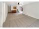 Spacious living room with ceiling fan, carpet floors, and built-in storage at 7873 Running Doe Ct, Las Vegas, NV 89149