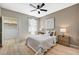 Bedroom with ceiling fan, closet, and natural light from a window at 8000 Badura Ave # 1007, Las Vegas, NV 89113