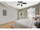 Bedroom with ceiling fan, closet, and natural light from a window at 8000 Badura Ave # 1007, Las Vegas, NV 89113