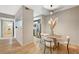 Cozy dining area adjacent to kitchen with modern lighting and sleek design at 8000 Badura Ave # 1007, Las Vegas, NV 89113