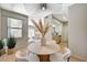Cozy dining area with view to the living room, kitchen and outdoor patio at 8000 Badura Ave # 1007, Las Vegas, NV 89113