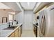 Modern kitchen featuring stainless steel appliances and sleek countertops at 8000 Badura Ave # 1007, Las Vegas, NV 89113
