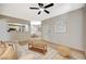 Open-concept layout showcasing the living room with view of the kitchen and dining area at 8000 Badura Ave # 1007, Las Vegas, NV 89113