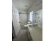Bathroom features a shower-tub combo, and a single sink vanity at 8215 Shell Beach Ct, Las Vegas, NV 89117