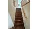 Hardwood staircase leading upstairs at 8215 Shell Beach Ct, Las Vegas, NV 89117