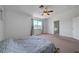 Light and airy bedroom featuring a large window with mountain views at 8333 Valley Stream Ave, Las Vegas, NV 89131