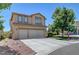 Charming two-story home featuring a three-car garage, desert landscaping, and a welcoming facade at 8333 Valley Stream Ave, Las Vegas, NV 89131
