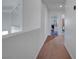 Upstairs hallway featuring hardwood floors and neutral-colored walls at 8333 Valley Stream Ave, Las Vegas, NV 89131