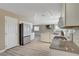 Bright kitchen featuring white cabinets, granite countertops, and stainless steel appliances at 8333 Valley Stream Ave, Las Vegas, NV 89131