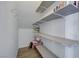 Shelved walk-in closet space for storage of clothes and accessories at 8333 Valley Stream Ave, Las Vegas, NV 89131