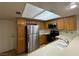 Kitchen featuring stainless steel appliances and wood cabinets at 8940 Antioch Way, Las Vegas, NV 89117