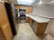 Kitchen featuring stainless steel appliances and wood cabinets at 8940 Antioch Way, Las Vegas, NV 89117