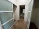Spacious walk-in closet provides ample storage, with frosted sliding doors and easy access to the bathroom at 8940 Antioch Way, Las Vegas, NV 89117