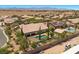 Drone shot showcasing a house with a backyard pool and desert landscaping in a neighborhood at 9270 Valerie Elaine St, Las Vegas, NV 89139