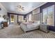 Elegant bedroom featuring plush carpeting, plantation shutters, and stylish decor at 9270 Valerie Elaine St, Las Vegas, NV 89139
