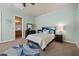 Serene bedroom with soothing colors, dark furniture, and soft carpeting at 9270 Valerie Elaine St, Las Vegas, NV 89139