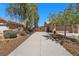 Long driveway leading to the home with decorative gate at 9270 Valerie Elaine St, Las Vegas, NV 89139