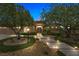 Inviting single-story home with stone accents, manicured landscaping, and pathway lighting at 9270 Valerie Elaine St, Las Vegas, NV 89139