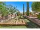 Well-maintained garden area with raised beds and landscaping, creating a serene outdoor space at 9270 Valerie Elaine St, Las Vegas, NV 89139