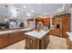 Gourmet kitchen with double islands, custom cabinets, and stainless steel appliances at 9270 Valerie Elaine St, Las Vegas, NV 89139