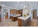 Spacious kitchen with dual islands, wooden cabinetry, and open access to other living areas at 9270 Valerie Elaine St, Las Vegas, NV 89139