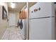 Convenient laundry room with washer, dryer, storage, and access to garage at 9270 Valerie Elaine St, Las Vegas, NV 89139