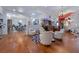 Expansive living area featuring hardwood floors, multiple seating arrangements, and elegant decor at 9270 Valerie Elaine St, Las Vegas, NV 89139