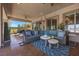 Cozy covered patio with comfortable seating, perfect for outdoor entertaining and relaxation at 9270 Valerie Elaine St, Las Vegas, NV 89139