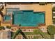 Aerial view of a serene pool and spa area with stylish landscaping and inviting ambiance at 9270 Valerie Elaine St, Las Vegas, NV 89139