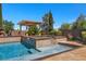 Inviting pool with spa and covered pergola for relaxing and enjoying the backyard at 9270 Valerie Elaine St, Las Vegas, NV 89139