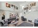 View of a living room featuring high ceilings, a staircase, and is open to the kitchen at 9301 Queen Charlotte Dr, Las Vegas, NV 89145