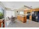 Eat in kitchen featuring black appliances, tile floors, and recessed lighting at , Henderson, NV 89074
