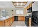 Kitchen featuring black appliances, plenty of cabinet space and light colored countertop at , Henderson, NV 89074