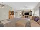 Inviting living room featuring vaulted ceilings, cozy seating, and built-in display cabinets at , Henderson, NV 89074