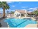 Stunning backyard with a large pool, ideal for entertaining, and a covered patio with a hot tub for ultimate relaxation at , Henderson, NV 89074