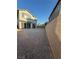 Spacious backyard featuring a retaining wall with low maintenance landscaping opportunities at 10148 Cluny Ave, Las Vegas, NV 89178