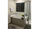 Bright bathroom featuring a soaking tub with separate glass door shower enclosure at 10148 Cluny Ave, Las Vegas, NV 89178
