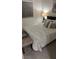 Bedroom with king bed, neutral colors, and carpet at 10148 Cluny Ave, Las Vegas, NV 89178