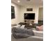 Comfortable living room with stylish furnishings, contemporary decor, and natural light at 10148 Cluny Ave, Las Vegas, NV 89178