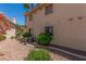 Backyard featuring desert landscaping at 1017 Falconhead Ln # 101, Las Vegas, NV 89128