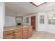 Bright living room showcasing an island with granite countertops and lots of natural light at 1017 Falconhead Ln # 101, Las Vegas, NV 89128