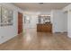 Spacious living area featuring tile floors and easy access to the kitchen and dining areas at 1017 Falconhead Ln # 101, Las Vegas, NV 89128