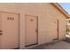 Multi-unit building featuring private exterior unit entrances and textured facade at 1017 Falconhead Ln # 101, Las Vegas, NV 89128