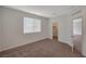 Bright bedroom features soft carpet, natural light, and closet access at 10198 Eden Mountain St, Las Vegas, NV 89141