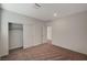 Bedroom features neutral walls, carpet flooring, and closet for efficient storage at 10198 Eden Mountain St, Las Vegas, NV 89141