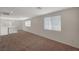 Spacious loft area filled with natural light from multiple windows at 10198 Eden Mountain St, Las Vegas, NV 89141